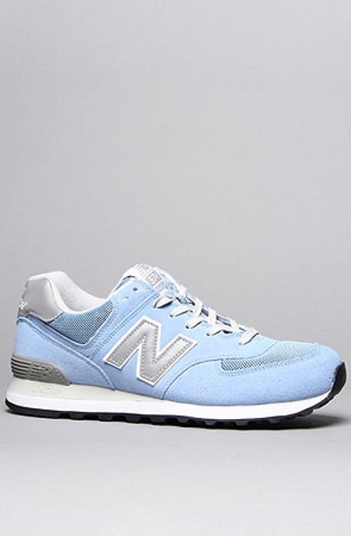 light blue new balance cleats