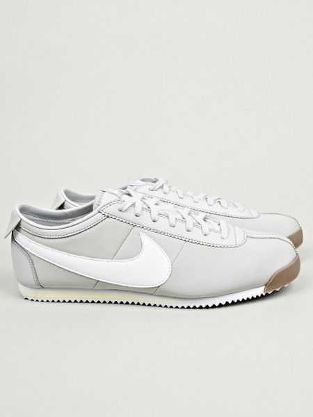 grey nike cortez mens