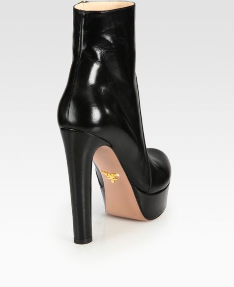 Black Leather platform ankle boots | Prada | MATCHESFASHION UK