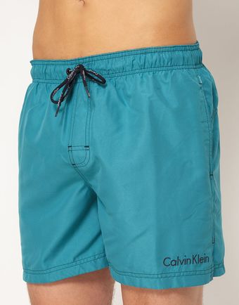 Calvin Klein Solid Logo Swim Shorts - Lyst