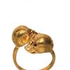 Alexander Mcqueen Twin Skulls Brass Ring in Gold - Lyst