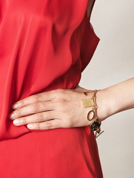 Stella Mccartney Monogram Bracelet in Gold - Lyst