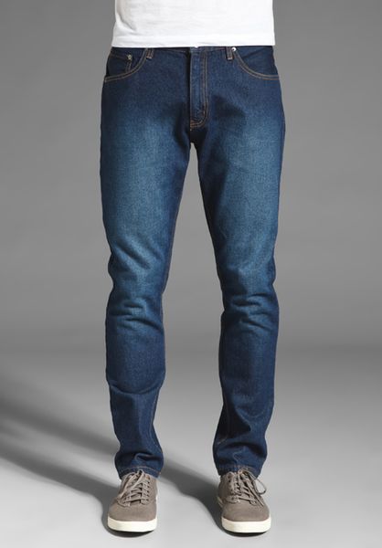 dark blue tapered jeans