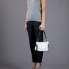 Tory Burch Tortoise Print Base Bag in White - Lyst