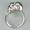 Alexander Mcqueen Twin Skull Ring in Silver - Lyst