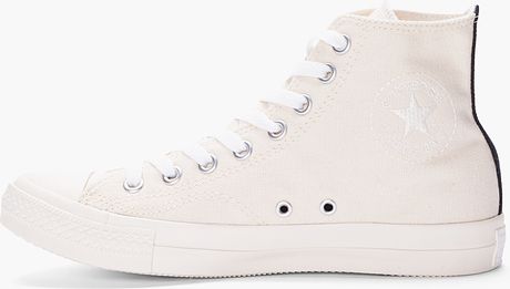 white with red heart converse