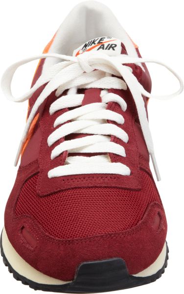 old red nike shoes