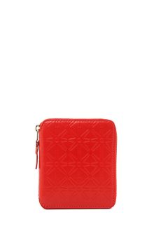 Comme Des Garçons Star Embossed Zip Fold Wallet in Orange - Lyst