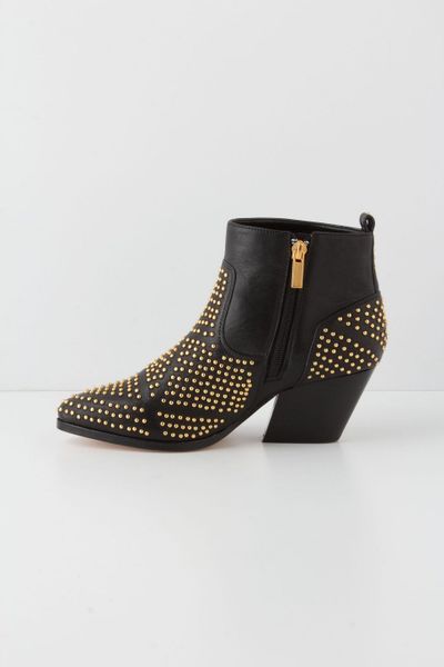 black and gold flat booties