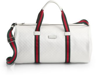 Gucci Leathertrimmed Logoembossed Nylon Duffel Bag - Lyst