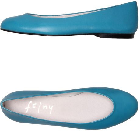 flat shoes with turquoise soles