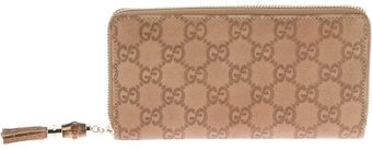 Gucci Logo Embossed Wallet - Lyst