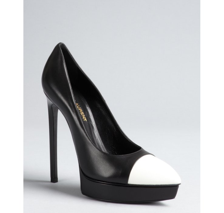 black pumps with white cap toe