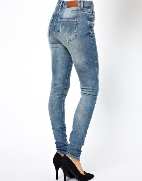 holey skinny jeans