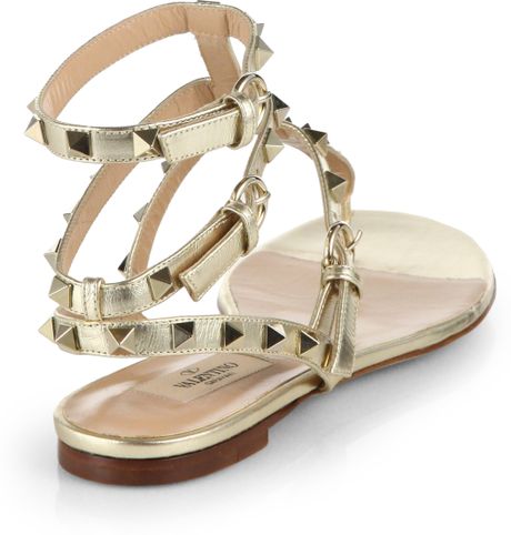 valentino thong rockstud sandals metallic leather gold