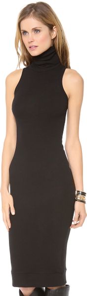 black sleeveless turtleneck outfit