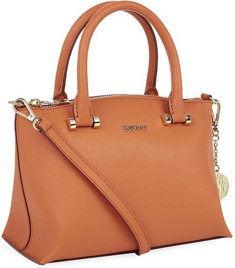 Dkny Mini Saffiano Trapeze Cross Body Bag in Orange