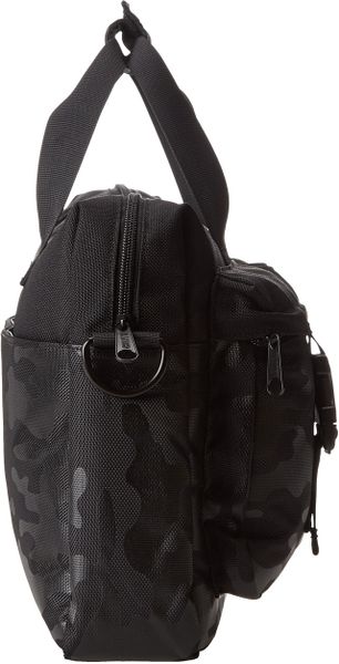 steve madden black camo backpack