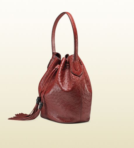 Gucci Lady Tassel Ostrich Bucket Bag in Red | Lyst
