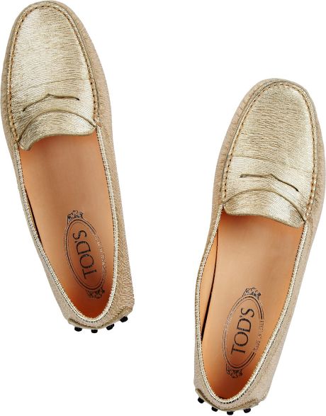 tods gold loafers