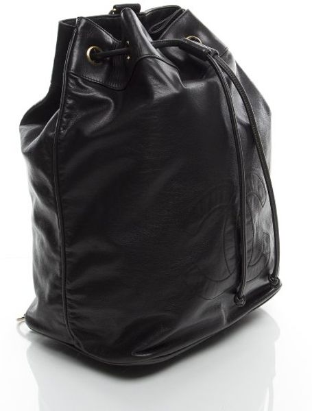 Chanel Preowned Black Lambskin Cc Drawstring Crossbody Bag in Black | Lyst