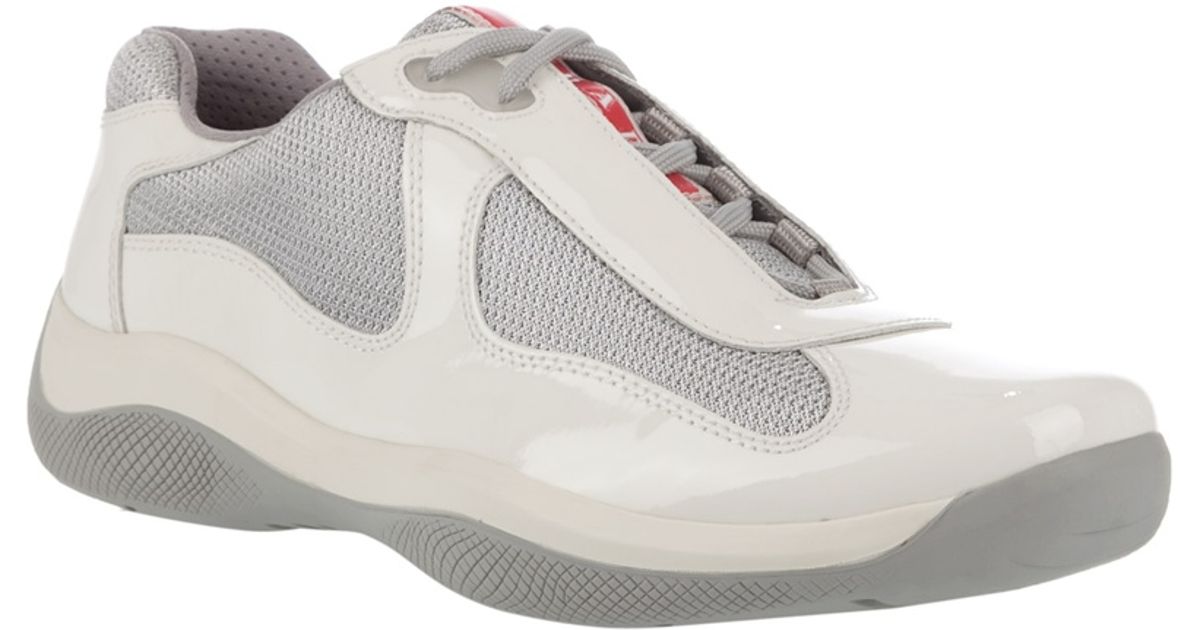 white and grey prada trainers