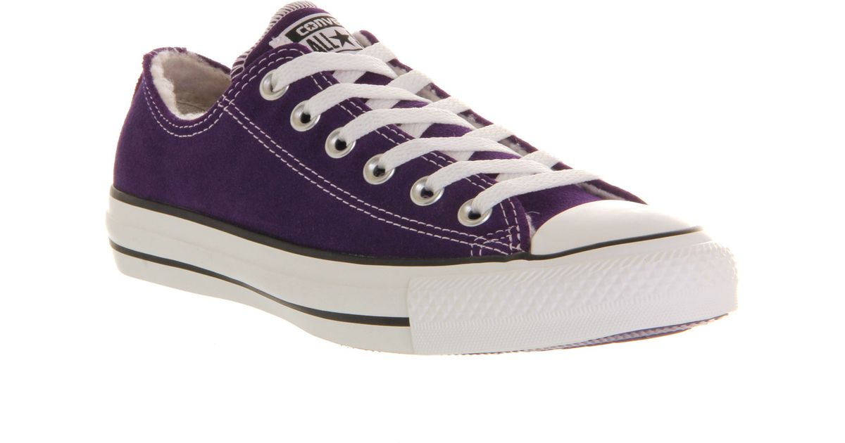 purple low cut converse