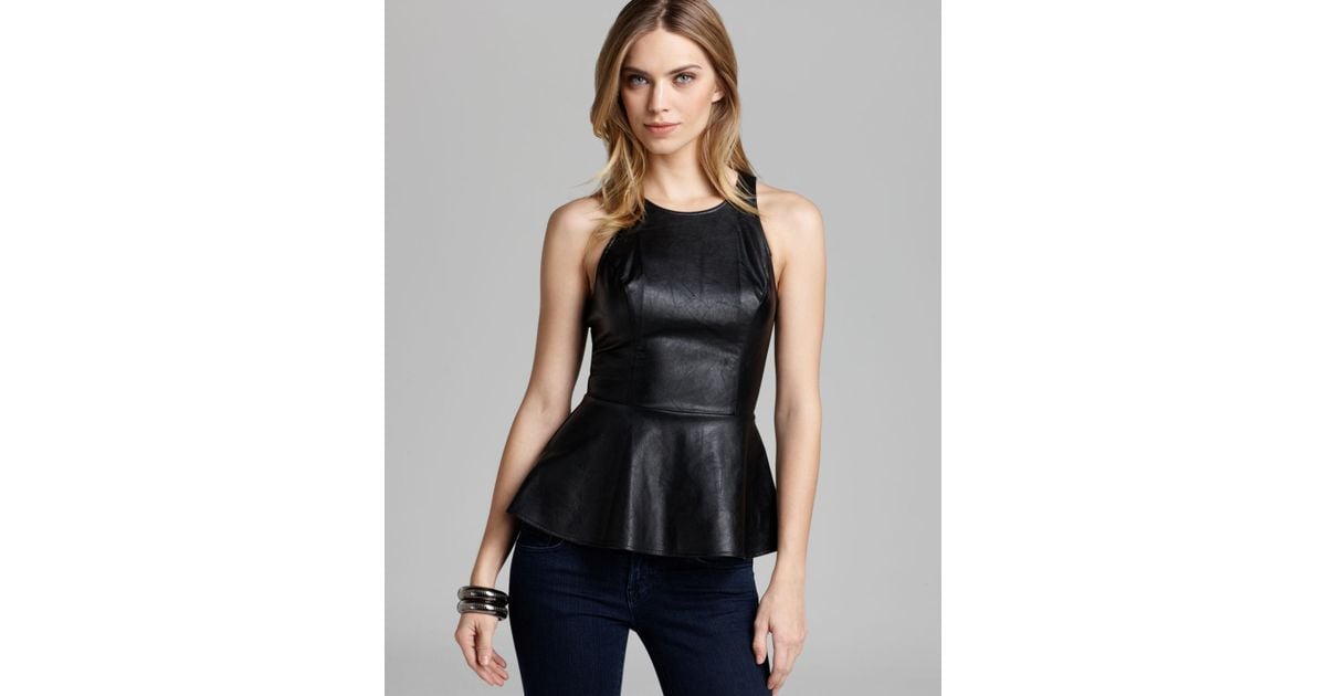 Lyst - Guess Top Faux Leather Peplum in Black