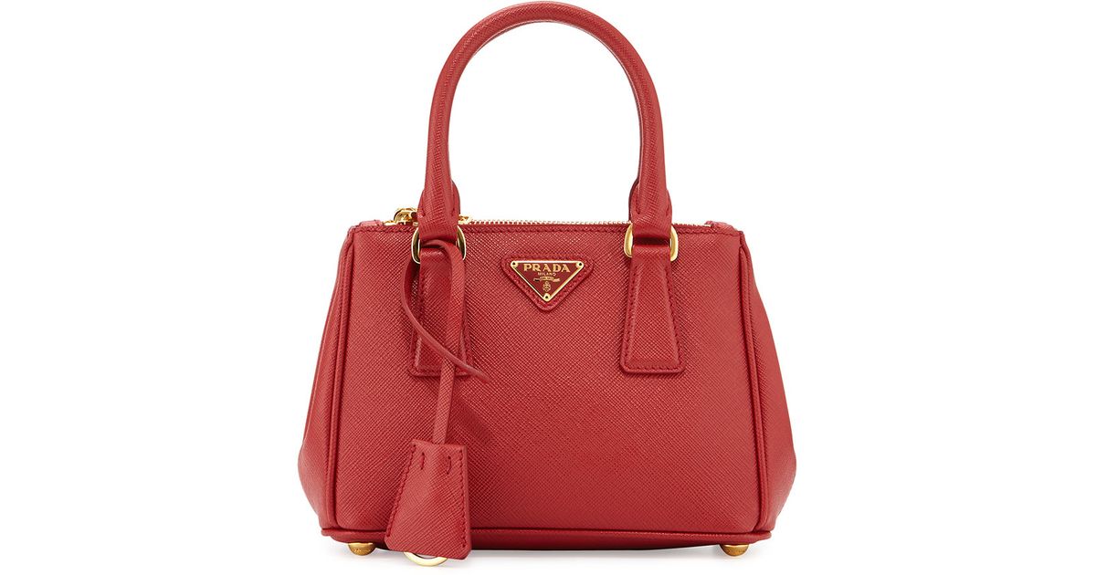 Lyst Prada Extra Mini Saffiano Leather Cross Body Bag In Red
