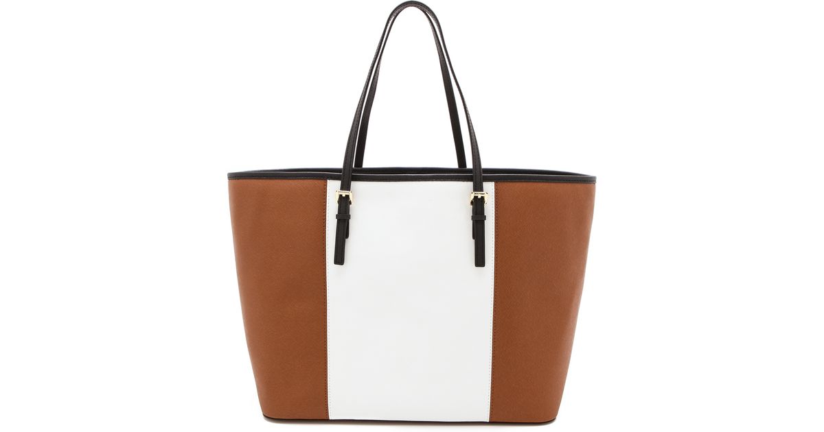 Lyst Michael Kors Jet Set Travel Tote Luggage Lyst Michael Kors Jet Set Travel Tote Luggage White Black In Brown