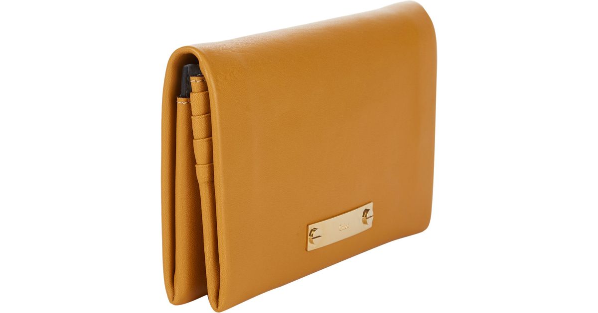 Chlo Fold-Over Long Flap Wallet in Yellow | Lyst