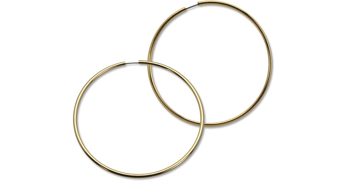 Lyst Guess Gold Tone Large Endless Hoop Earrings In Metallic