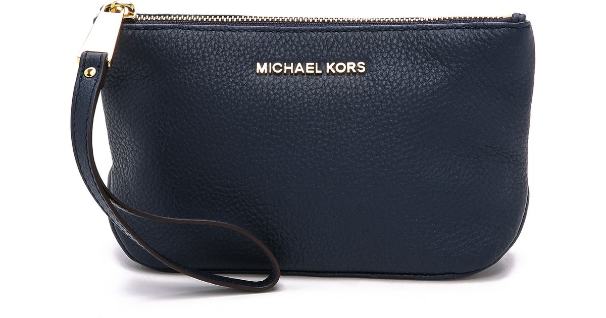 Lyst Michael Kors Rhea Zip Large Pouch Chili In Blue
