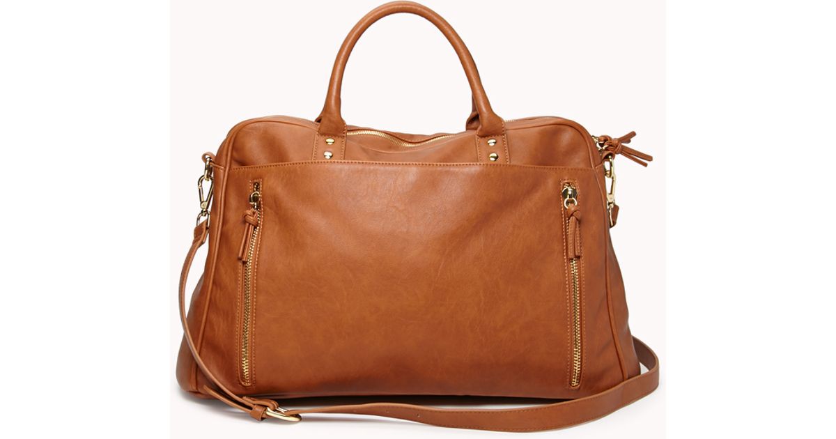 Lyst Forever 21 Faux Leather Duffle Bag In Brown