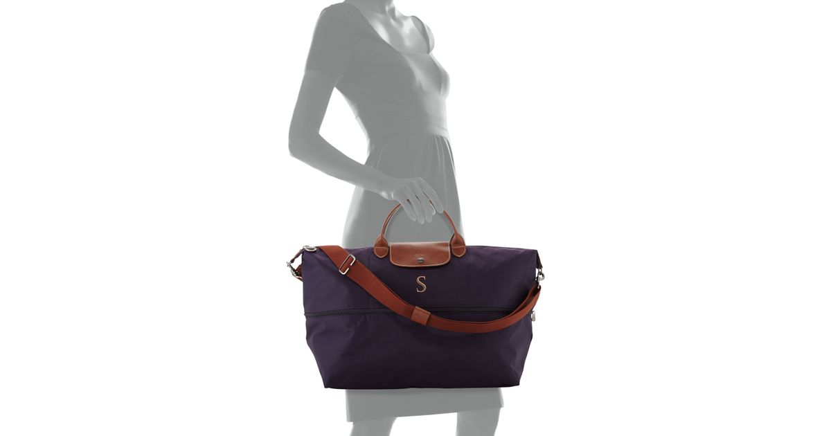 Lyst Longchamp Le Pliage Monogrammed Expandable Travel Bag In Blue