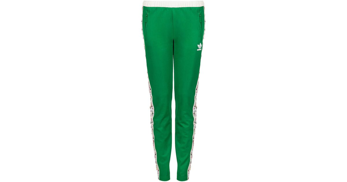 green tracksuit white stripe