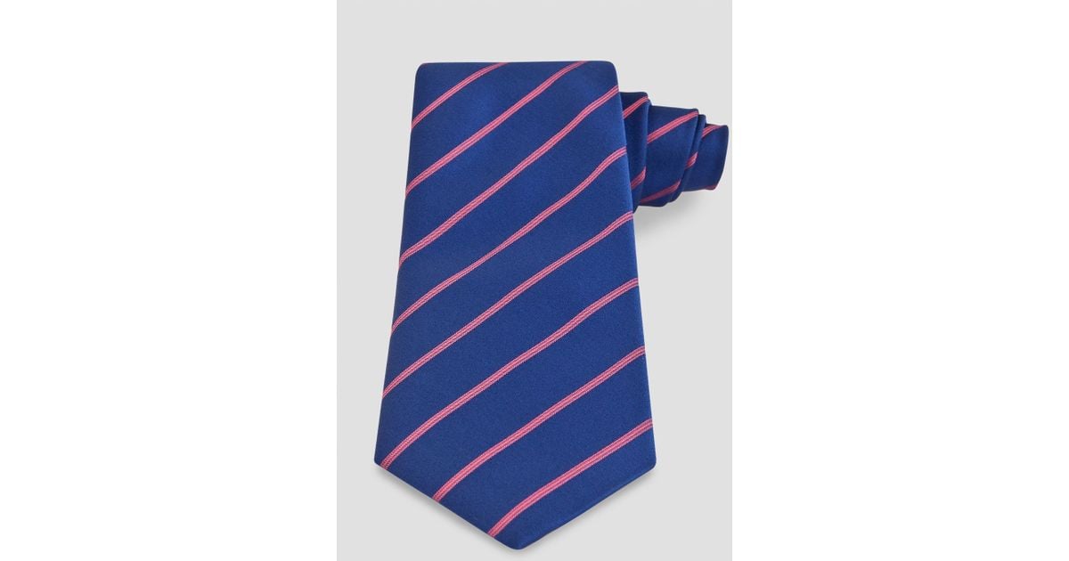 Today, the heritage brand is best known for its sharply tailored shirts in an array of style, patterns and stripes. Add a directional flair to smart ensembles with men's Thomas Pink ties. From woven silk styles to satin bowties, find the perfect finishing touch to eveningwear within this refined collection.