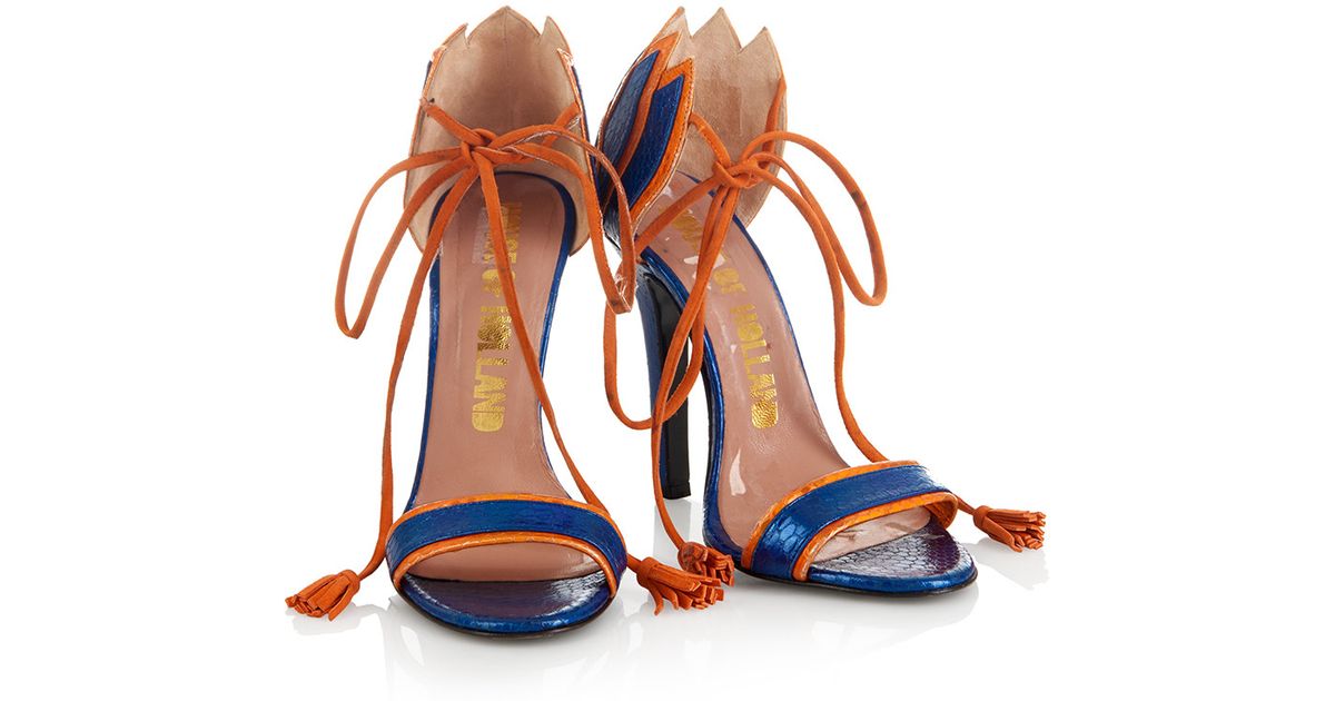 orange tassel heels