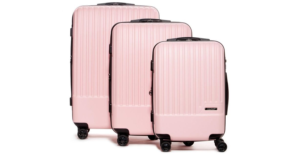 light pink suitcase