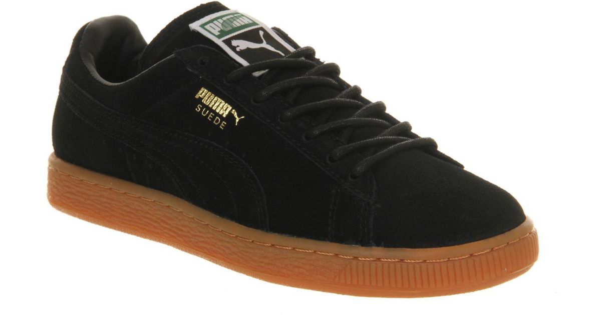 black suede pumas men's