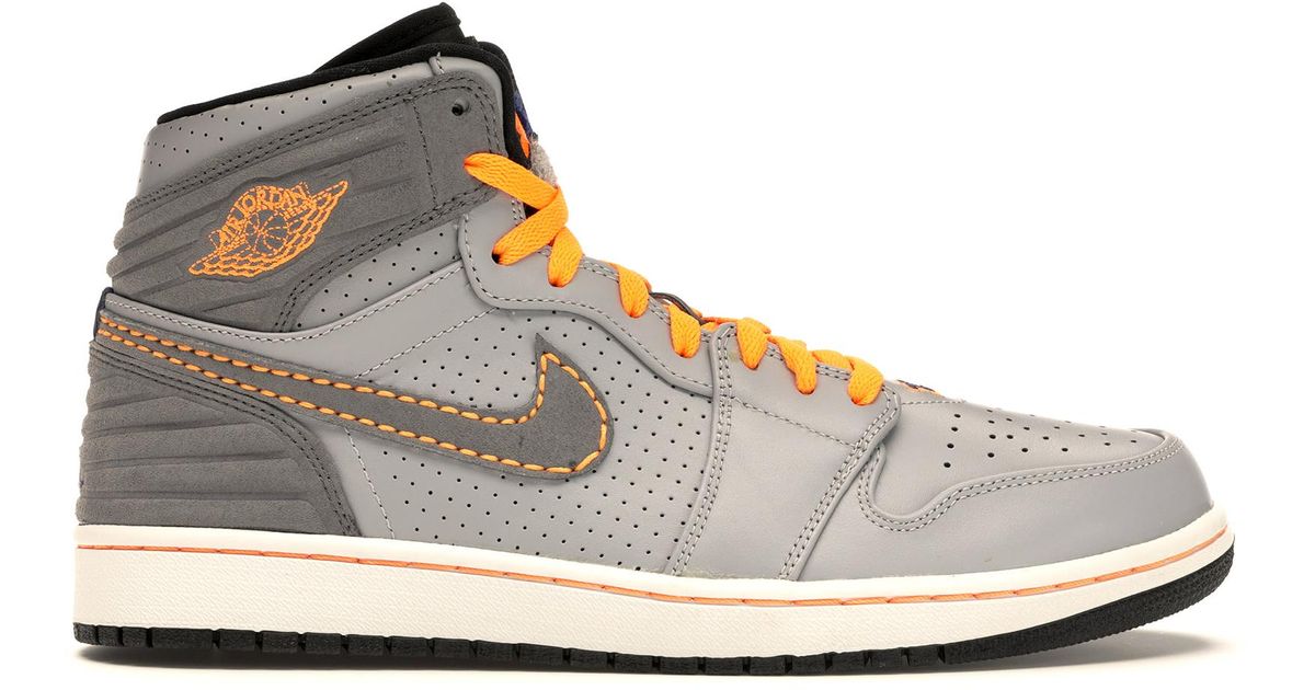 gray and orange nike shoes