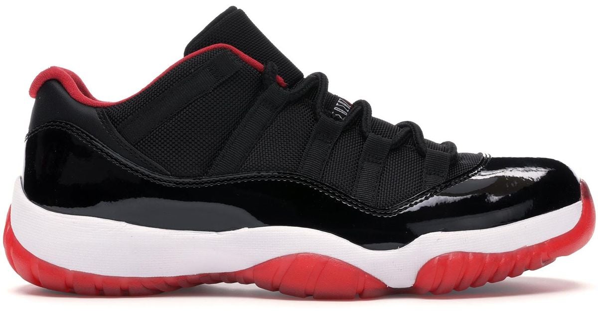 Nike 11 Retro Low Bred in Black for Men - Lyst