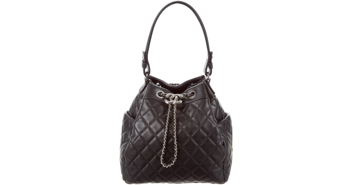 Lyst Chanel 2017 Small Chain Bucket Drawstring Bag Black In Metallic