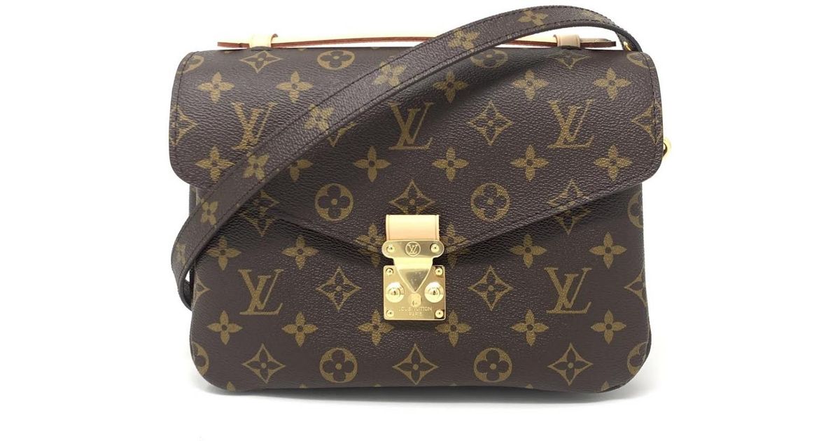 Lyst - Louis Vuitton Pre-owned Metis Brown Cloth Handbags in Brown