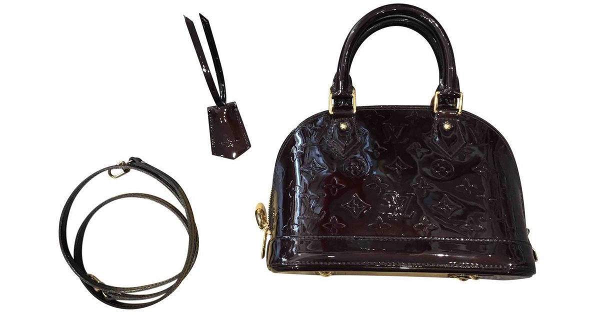 Lyst Louis Vuitton Alma Bb Patent Leather Crossbody Bag In Black