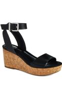 Bcbgeneration Barca Metallic Wedge Sandals in Black (black/wood) | Lyst