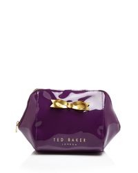 Ted Baker | Purple Rochel Extra Large Bow Trapeze Cosmetic Case | Lyst
