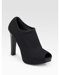 Stuart Weitzman | Black Forgive Peep-toe Stretch Ankle Boots | Lyst