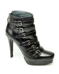 Stuart Weitzman | Iron Lady - Black Leather Buckled Bootie | Lyst