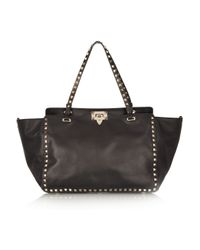 Valentino | Black The Rockstud Leather Trapeze Bag | Lyst